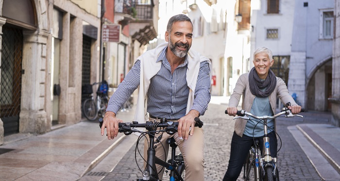 Couple riding bikes in Europe image