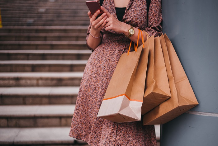 Female holding shopping bags
