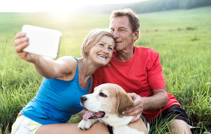 Couple and dog selfie image