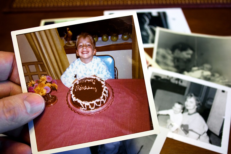 Vintage photograph of child and birthday cake