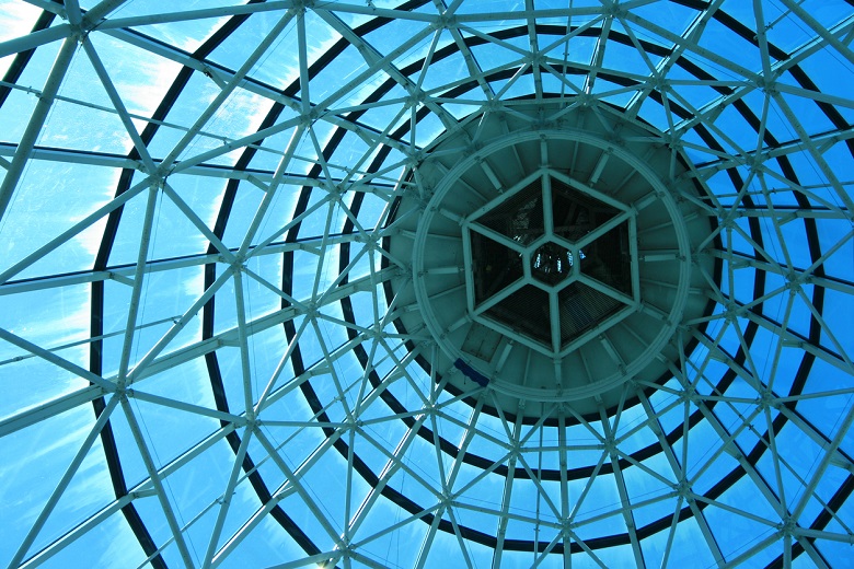 glass dome ceiling with blue sky